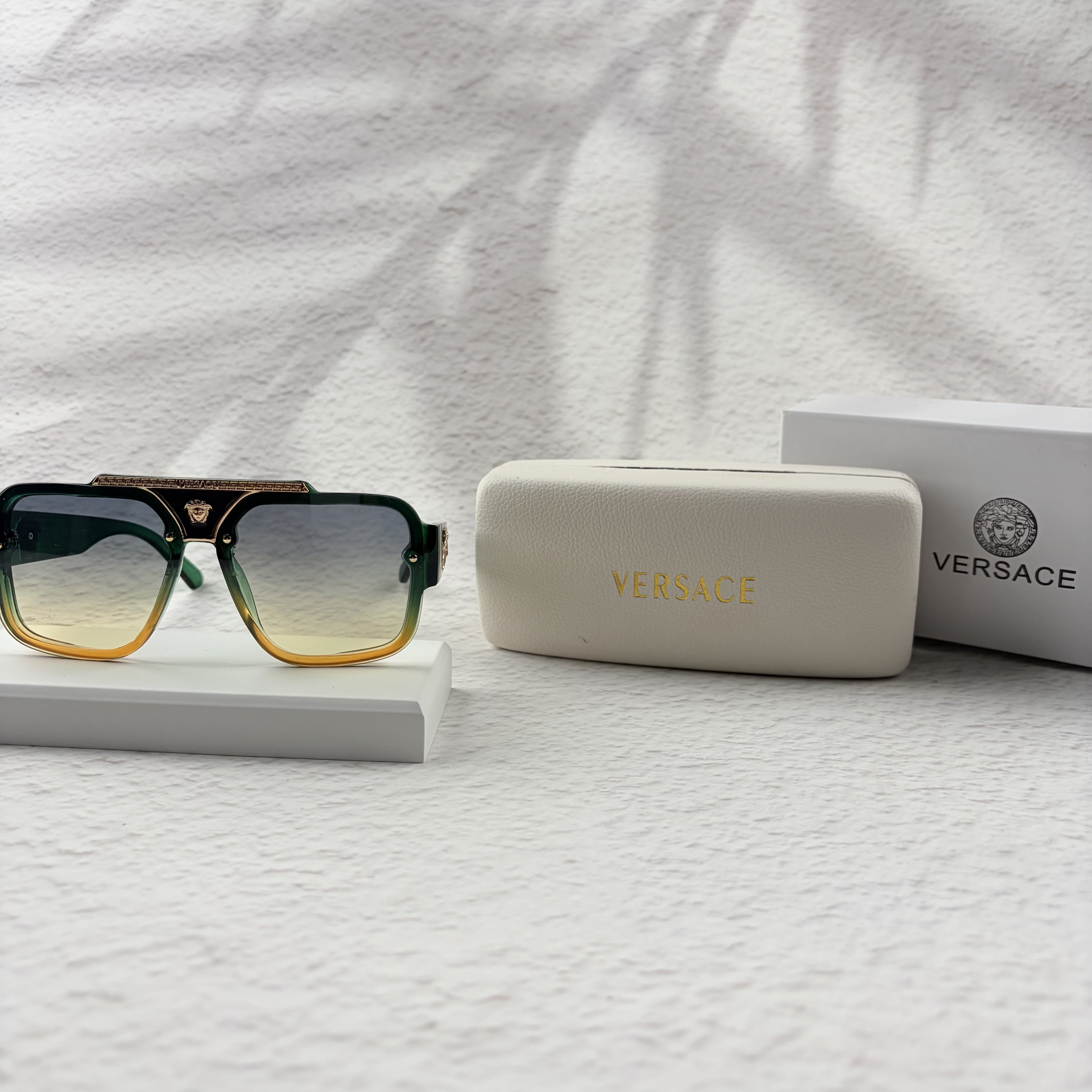 Geometric Gradient Sunglasses with Gold Accents for UV Protection