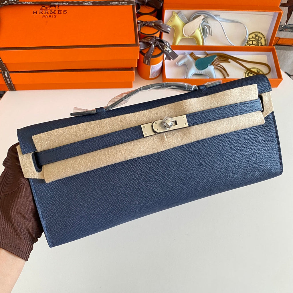 HERMES KELLY CUT 31 IN CLASSIC BLUE CALFSKIN WITH SILVER HARDWARE
