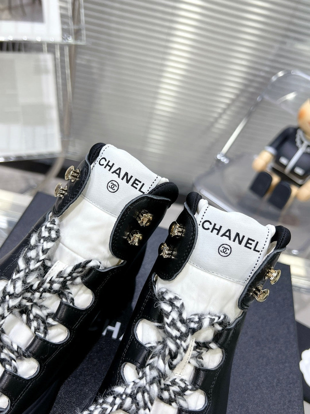 CHANEL CANO ALTO SNEAKER IN BLACK CALFSKIN AND RUBBER