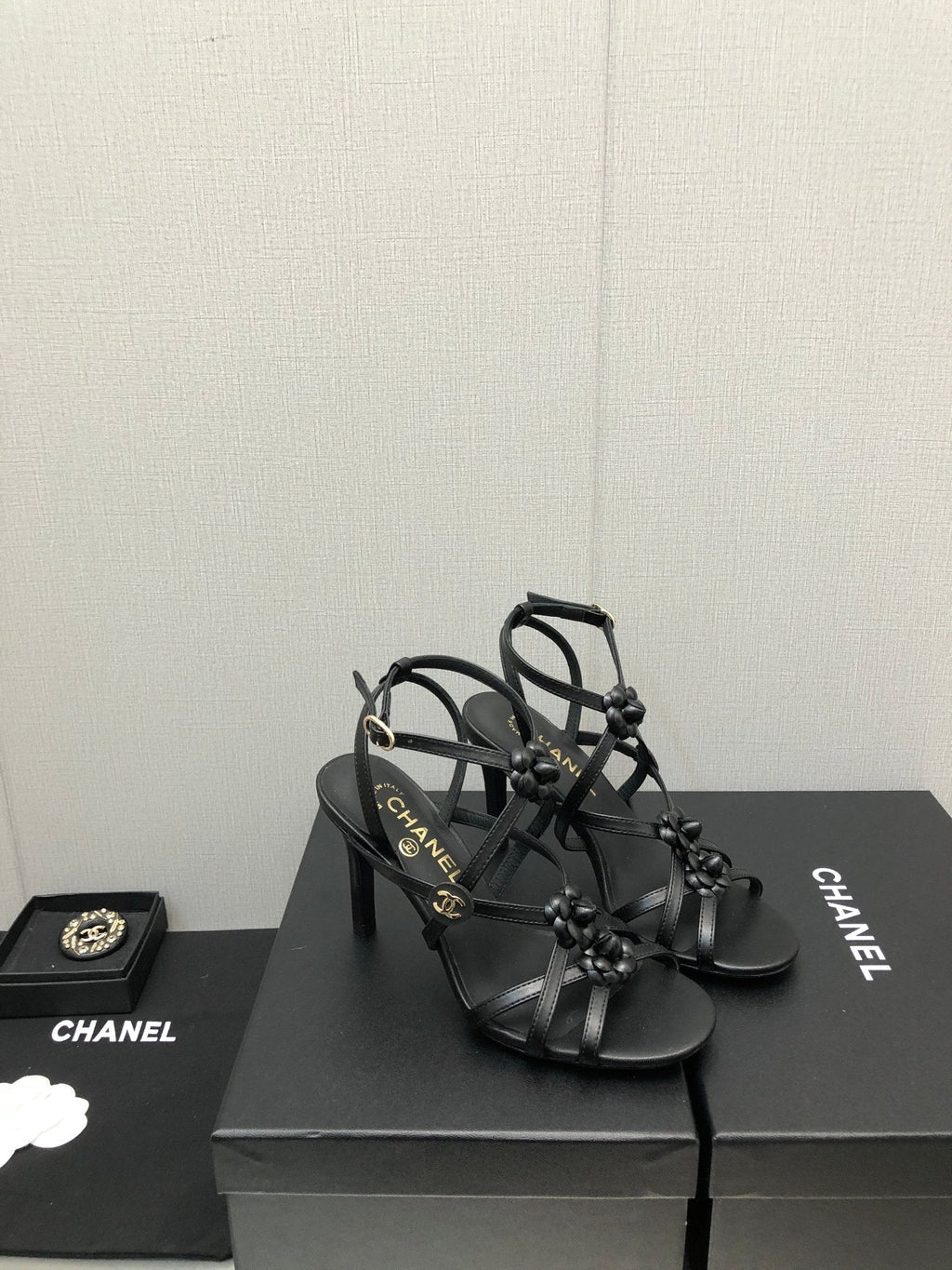 CHANEL FLORAL HIGH HEEL SANDAL IN BLACK LAMBSKIN
