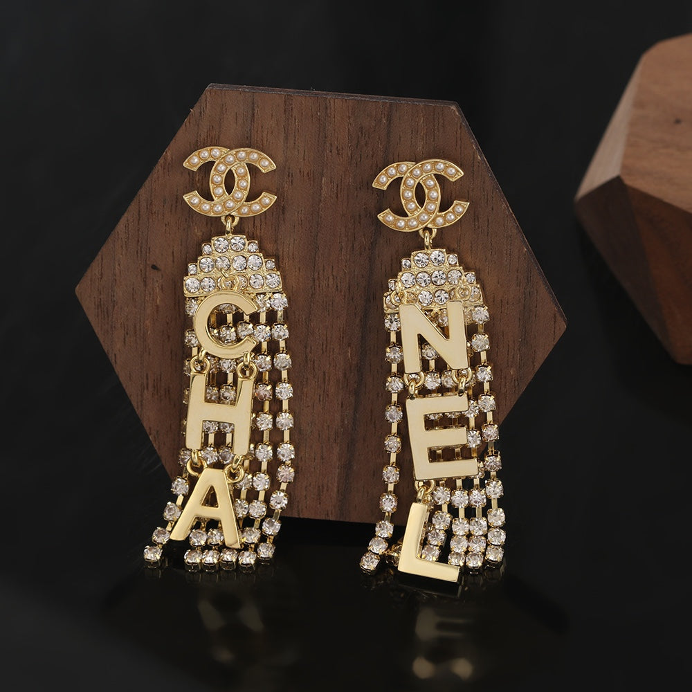 18K  Chanel Letter Earrings