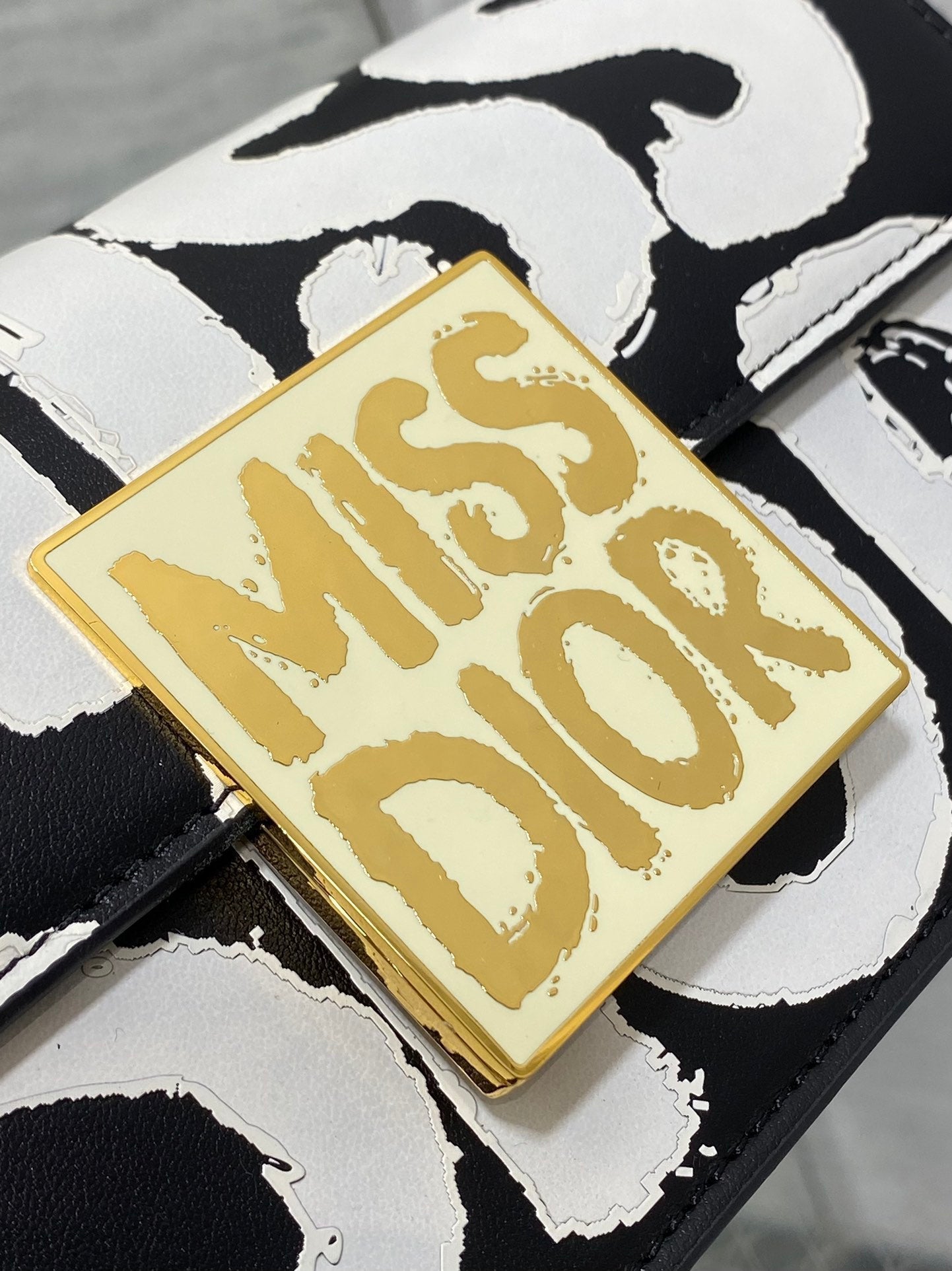 DIOR SMALL 22 FLAP BAG IN BLACK MIX WHITE LAMBSKIN WITH GOLD HARDWARE