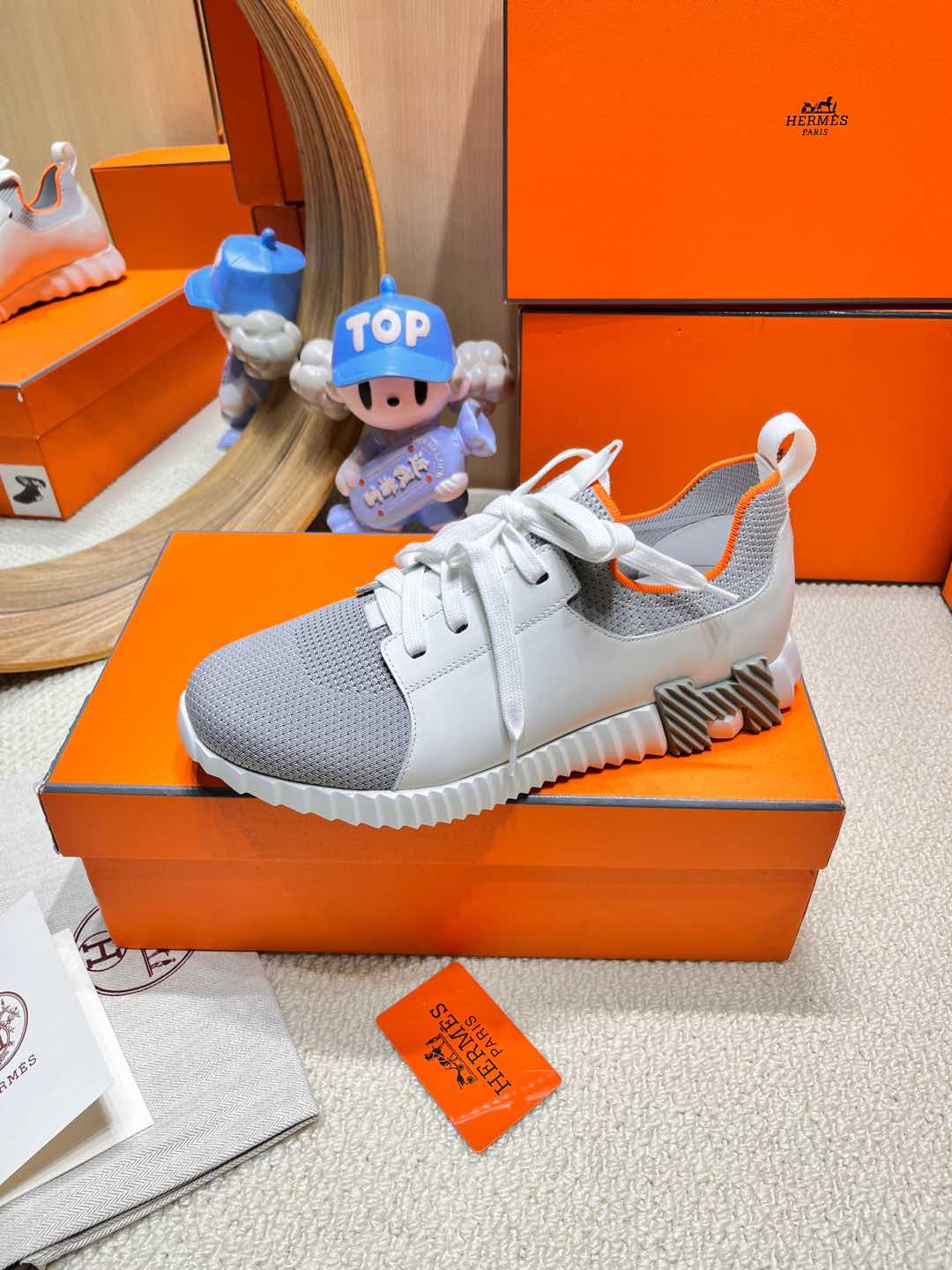 HERMES DEPART SLIP-ON SNEAKER IN WHITE MIX SHARK GRAY KNIT AND CALFSKIN
