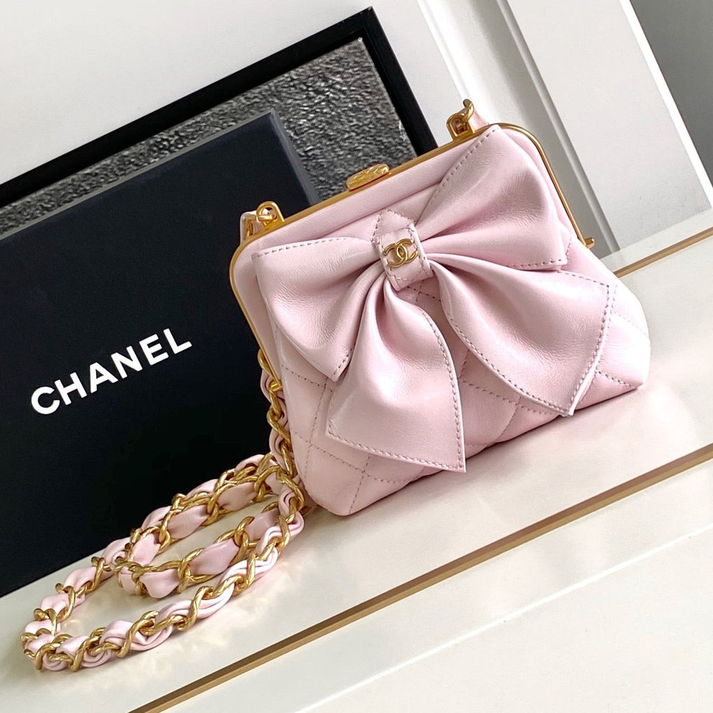 CHANEL MINI 13 CLUTCH WITH STRAP IN LIGHT PINK LAMBSKIN ATTACH BOW