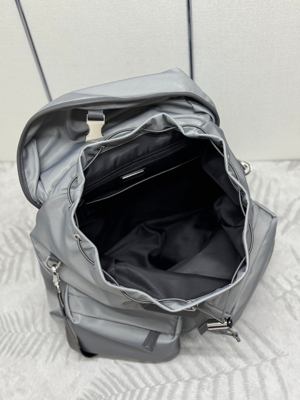 PRADA TRIANGLE LOGO BACKPACK 42 IN RHINO GRAY RE-NYLON